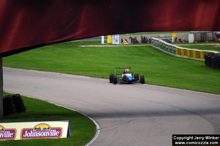 Chris Miller's F2000 recovers after spinning off at turn 8