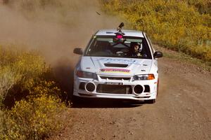 The David Summerbell / Mike Fennell Mitubishi Lancer Evo IV goes into the first hard corner of SS1.