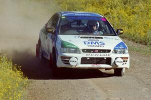 The Hiroyuki Genta / Kazmasa Takata Subaru Impreza near the start of SS1.