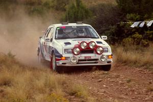 The Garen Shrader / Doc Shrader Ford Sierra Cosworth comes into the spectator corner before sundown.