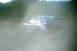 The Garen Shrader / Doc Shrader Ford Sierra Cosworth drifts through the spectator corner before sundown.