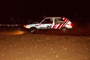 The Dave White / David Watts VW GTI comes through the spectator corner at night.