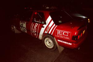 The Mike Whitman / Paula Gibeault Ford Sierra Cosworth checks into the final MTC at the headquarters.