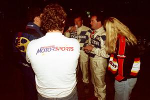 L to R) Jeff Becker, a Hyundai crew member, Charles Bradley, Noel Lawler and his wife converse at the finish of the event.