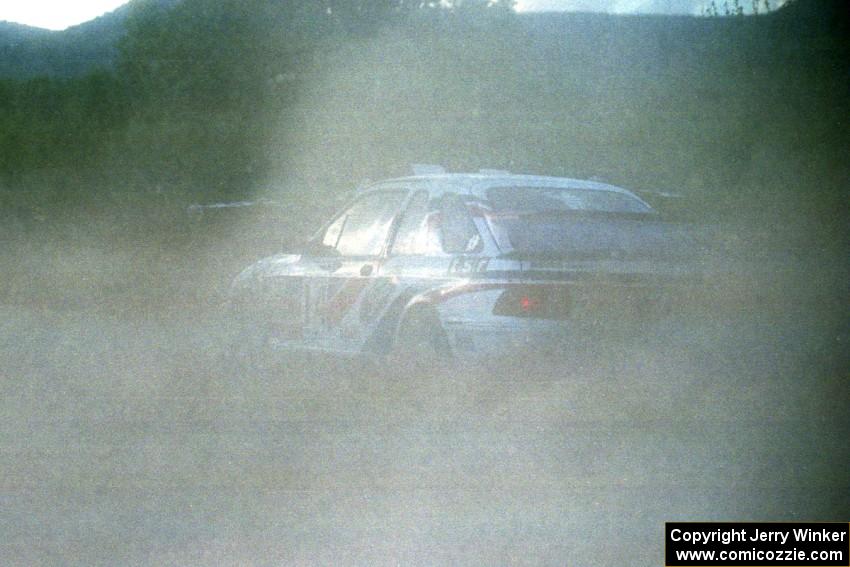 The Garen Shrader / Doc Shrader Ford Sierra Cosworth drifts through the spectator corner before sundown.