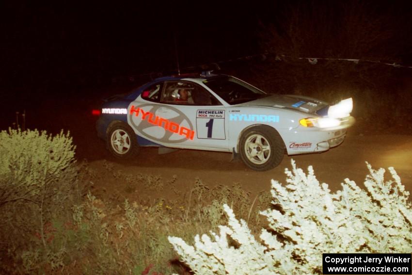 Paul Choinere / Jeff Becker through the spectator corner at night in their Hyundai Tiburon.