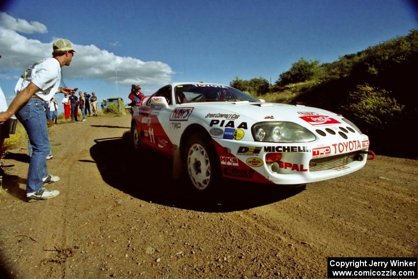 Ralph Kosmides / Joe Noyes blast away from the start of SS1 in their Toyota Supra Turbo.