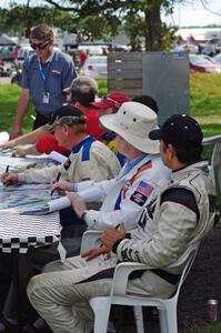 T/A Drivers' autograph session: Jim Derhaag, Simon Gregg and Tomy Drissi in the foreground