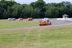 Tony Ave leads Tomy Drissi, R.J. Lopez, Simon Gregg, Jim Derhaag, Buddy Cisar and Bobby Sak on the pace lap into turn 5.