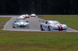 Tony Ave leads Tomy Drissi, R.J. Lopez, Bobby Sak, Jim Derhaag and Simon Gregg on lap two