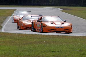 The Chevy Corvettes of Bobby Sak, Jim Derhaag and Simon Gregg battle early on