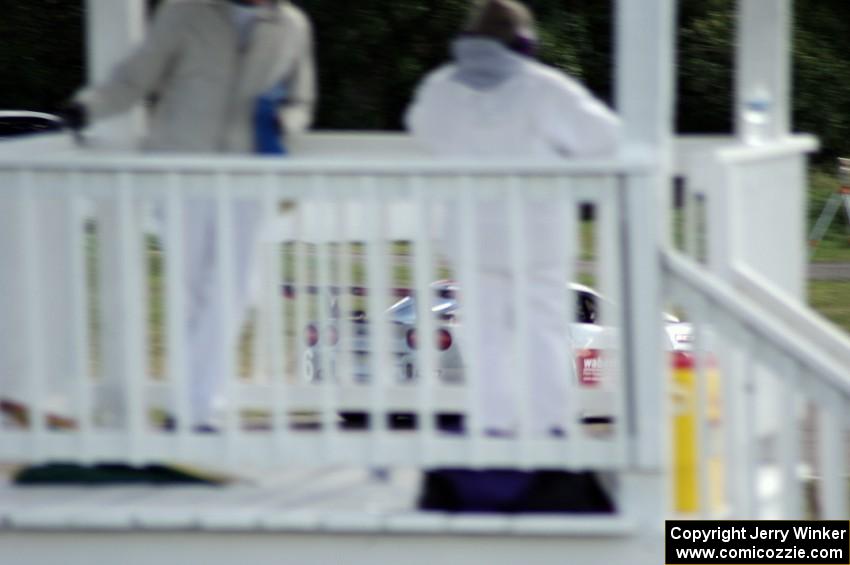 Corner worker Beryl Ann Burton watches R.J. Lopez's Chevy Corvette go past her turn two station.