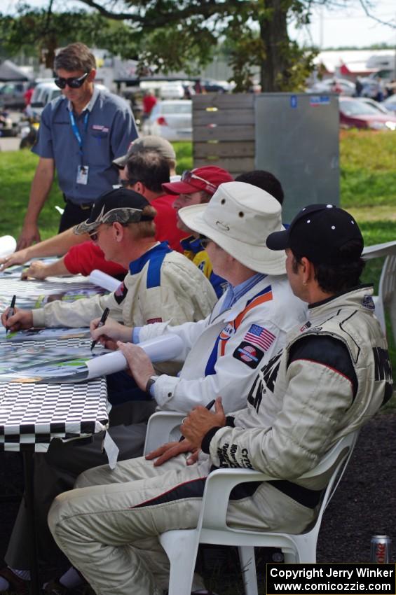 T/A Drivers' autograph session: Jim Derhaag, Simon Gregg and Tomy Drissi in the foreground