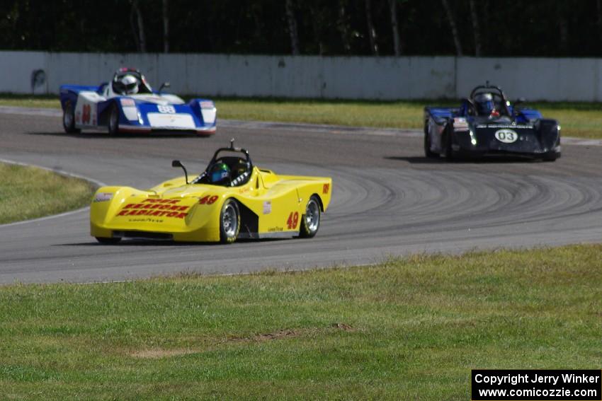 Carl Harris', Robert Reed's and Dave Schaal's Spec Racer Fords go through the carousel