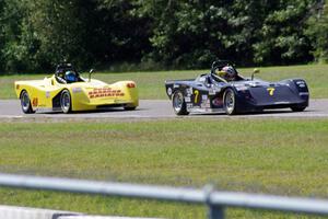 Tray Ayers leads Carl Harris into turn six during the Spec Racer Ford race