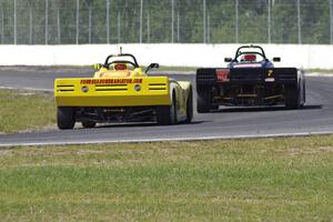Tray Ayers leads Carl Harris through turn six during the Spec Racer Ford race