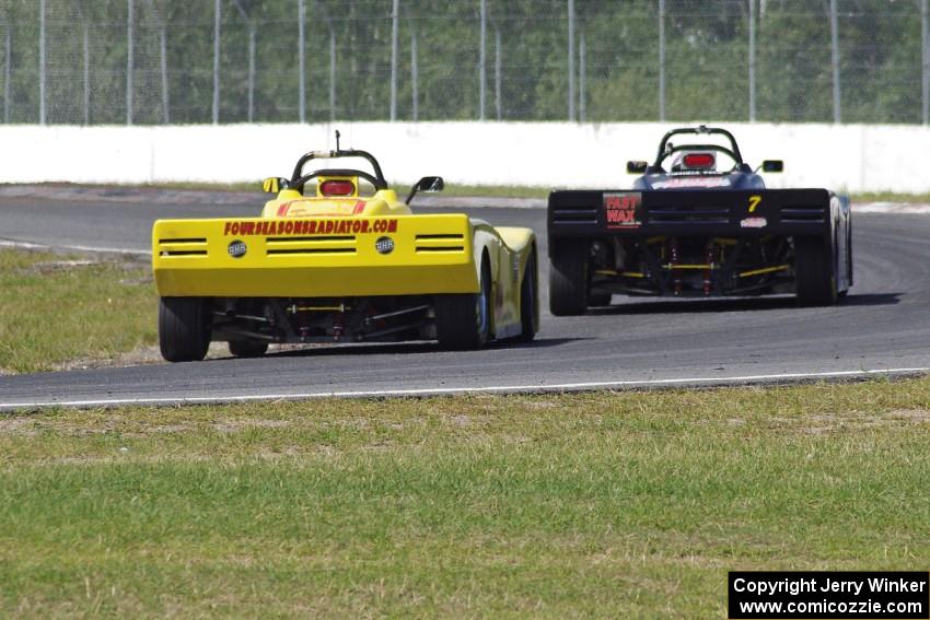 Tray Ayers leads Carl Harris through turn six during the Spec Racer Ford race