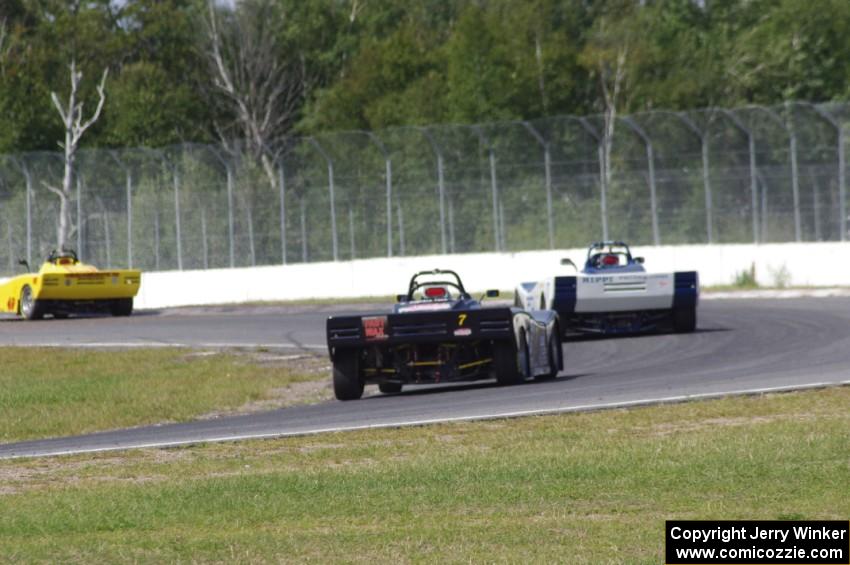 Carl Harris, Scott Rettich and Tray Ayers battle during the Spec Racer Ford race