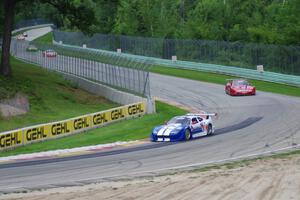 Daniel Ramoutarsingh's Jaguar XKR, Amy Ruman's Chevy Corvette, Simon Gregg's Chevy Corvette and John Baucom's Ford Mustang