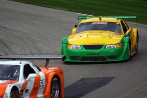 Simon Gregg's Chevy Corvette and John Baucom's Ford Mustang