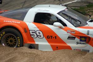 Simon Gregg's Chevy Corvette stopped in the gravel trap at turn 12