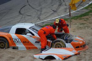 Simon Gregg's Chevy Corvette gets freed from the gravel trap