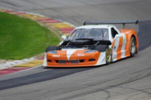 Simon Gregg's Chevy Corvette minus some bodywork after the excursion