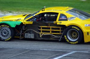 John Baucom's Ford Mustang was missing some bodywork late in the race