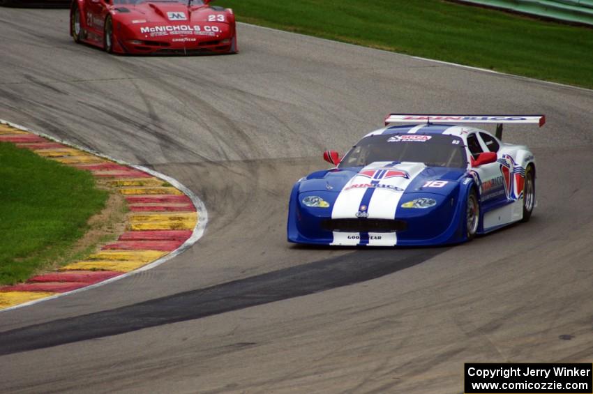 Daniel Ramoutarsingh's Jaguar XKR and Amy Ruman's Chevy Corvette