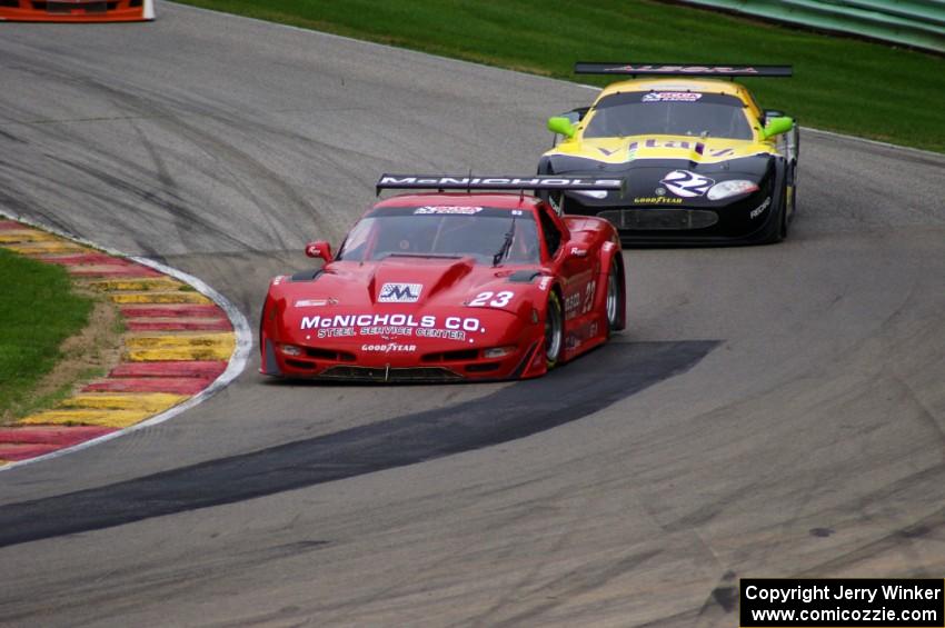 Amy Ruman's Chevy Corvette and Carlos de Quesada's Jaguar XKR