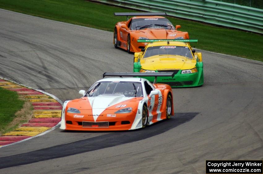 Simon Gregg's Chevy Corvette, John Baucom's Ford Mustang and Doug Harrington's Chevy Corvette