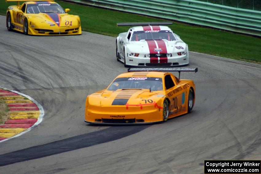 David Jans' Ford Mustang, Denny Lamers' Ford Mustang and Jim Bradley's Chevy Corvette