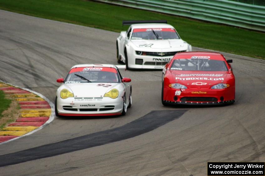 Gary Stewart's Porsche 996, Ricky Sanders' Chevy Monte Carlo and Gregg Rodgers' Chevy Camaro