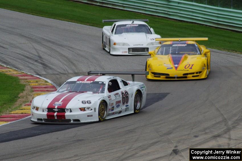 Denny Lamers' Ford Mustang, Jim Bradley's Chevy Corvette and Dave Ruehlow's Ford Mustang