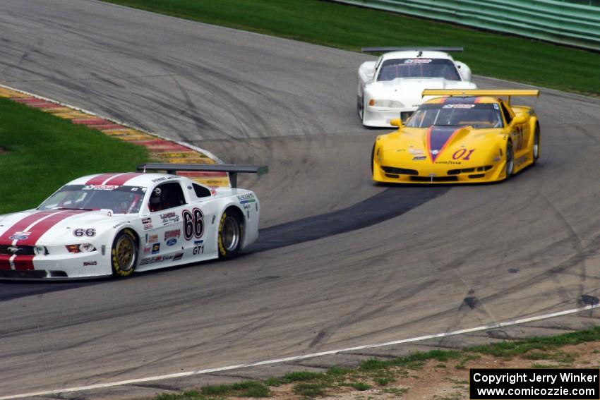 Denny Lamers' Ford Mustang, Jim Bradley's Chevy Corvette and Dave Ruehlow's Ford Mustang