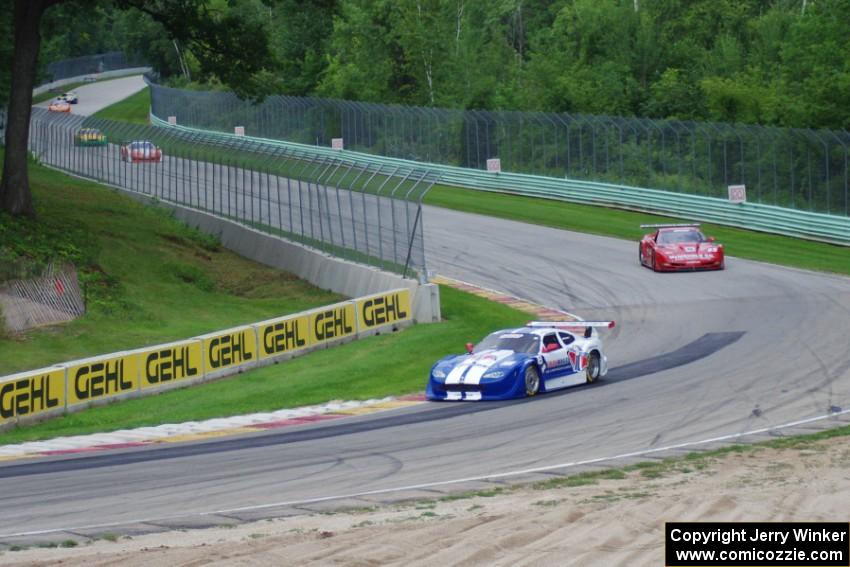 Daniel Ramoutarsingh's Jaguar XKR, Amy Ruman's Chevy Corvette, Simon Gregg's Chevy Corvette and John Baucom's Ford Mustang