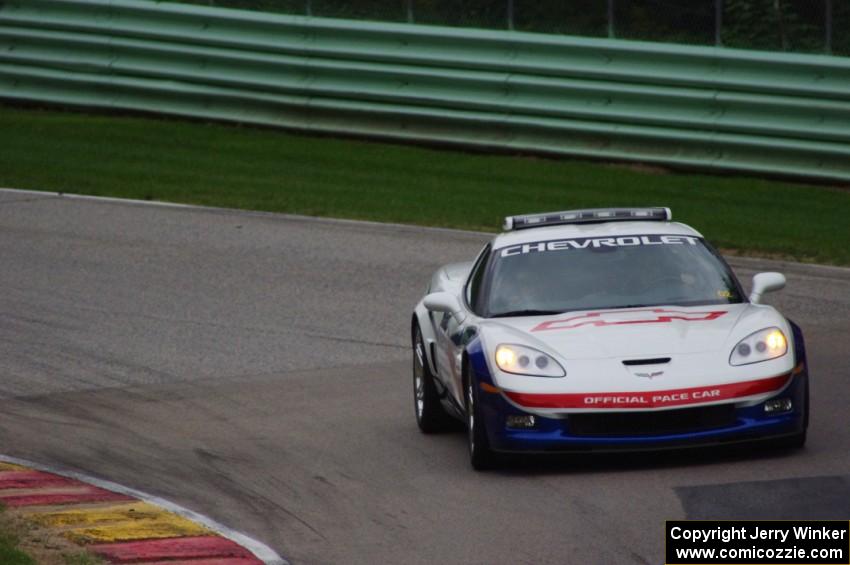 The pace car comes out mid-race to bunch up the field.