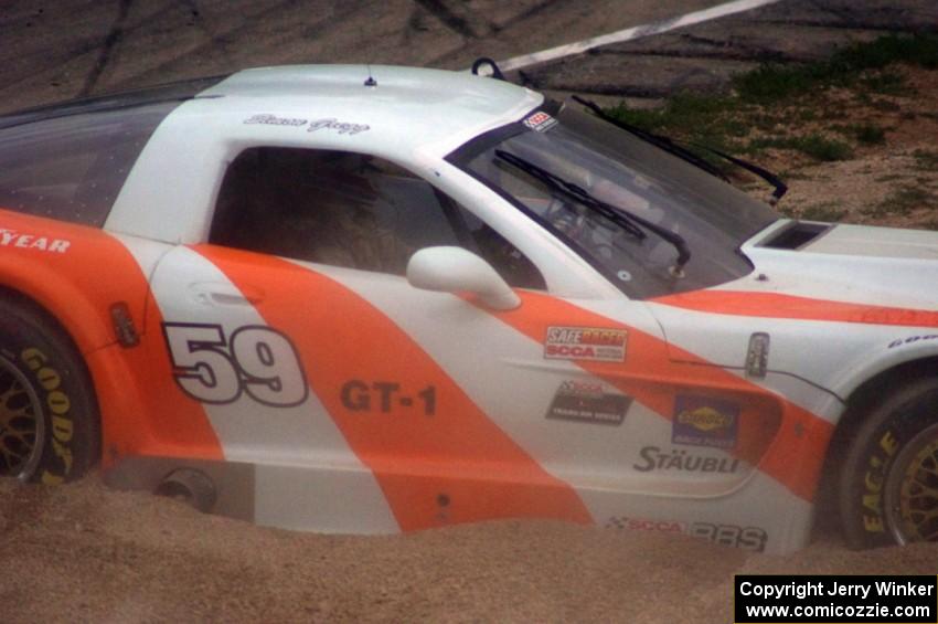 Simon Gregg's Chevy Corvette stops in the gravel trap at turn 12