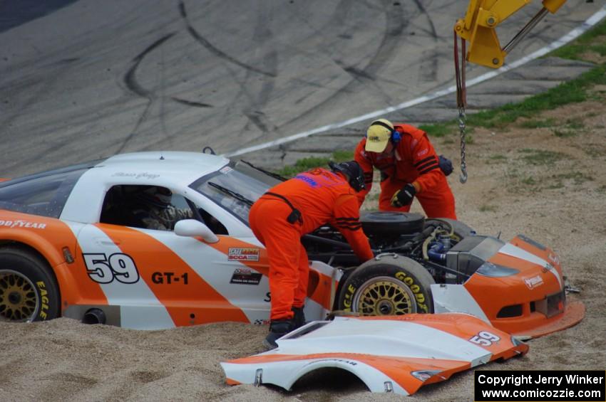 Simon Gregg's Chevy Corvette gets freed from the gravel trap