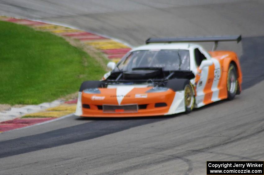 Simon Gregg's Chevy Corvette minus some bodywork after the excursion