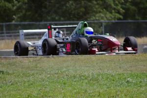 Jason Wolfe and Scott Rettich battle in the Formula Enterprises race