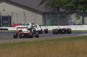 Jason Wolfe, Scott Rettich, Patrick Gallagher and Jim Libecco battle in the Formula Enterprises race