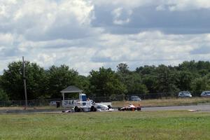 Scott Rettich, Jason Wolfe and Patrick Gallagher battle late in the Formula Enterprises race