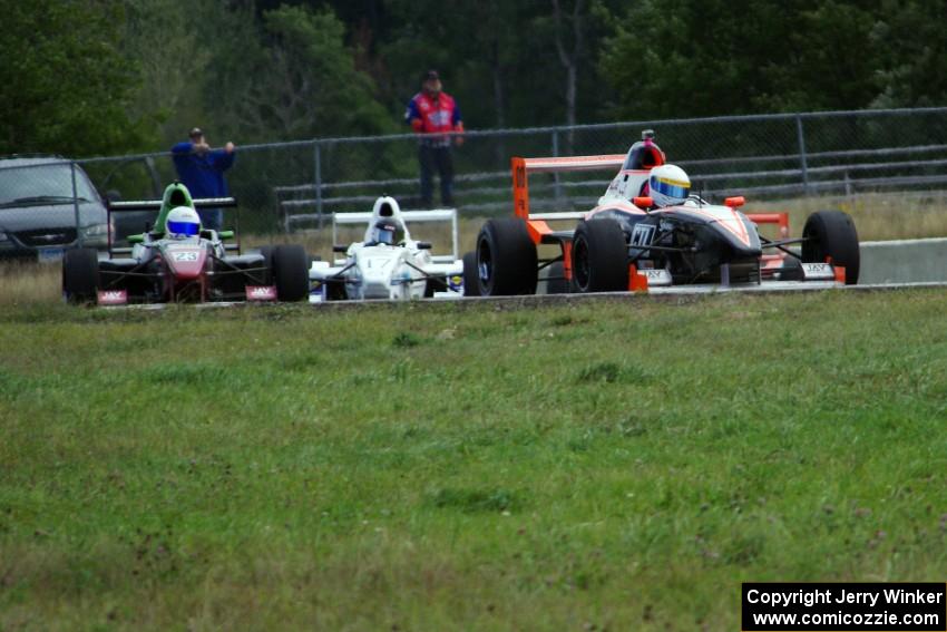 Patrick Gallagher, Jason Wolfe and Scott Rettich battle in the Formula Enterprises race