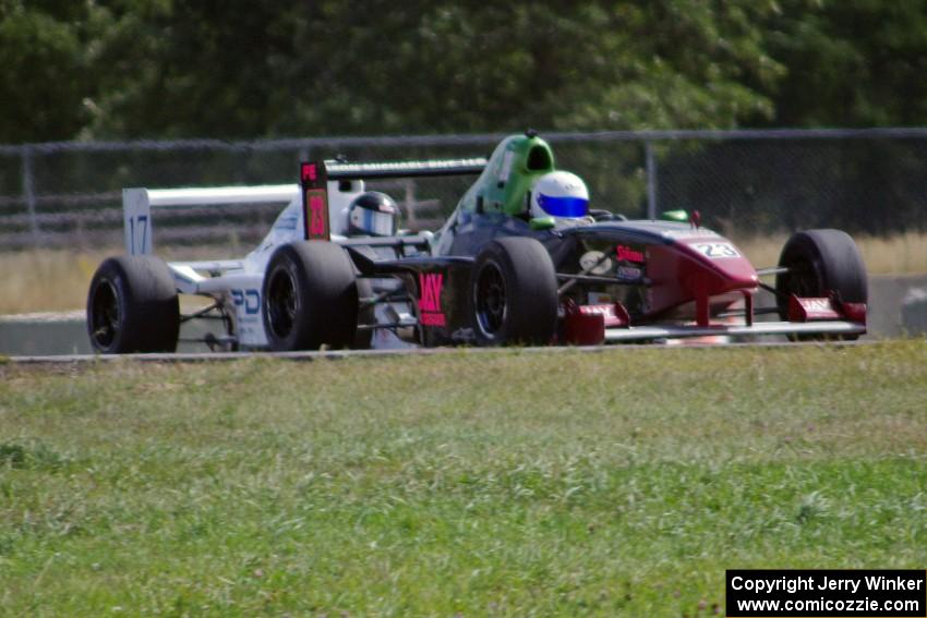 Jason Wolfe and Scott Rettich battle in the Formula Enterprises race