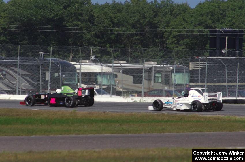 Jason Wolfe and Scott Rettich battle in the Formula Enterprises race