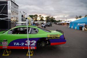 Bill Prietzel's Chevy Monte Carlo in the paddock at sundown
