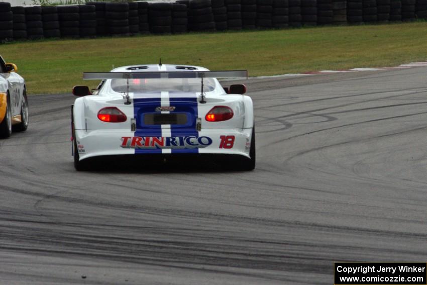 Daniel Ramoutarsingh's Jaguar XKR passes Tim Gray's Porsche GT3 Cup