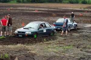 Martin Asao's MA Subaru Impreza gets a tug from Brian Chabot's MA Subaru Impreza