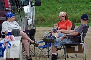 Mary Utecht, Carrie Carlson and Will Cammack watch Carrie's nephew